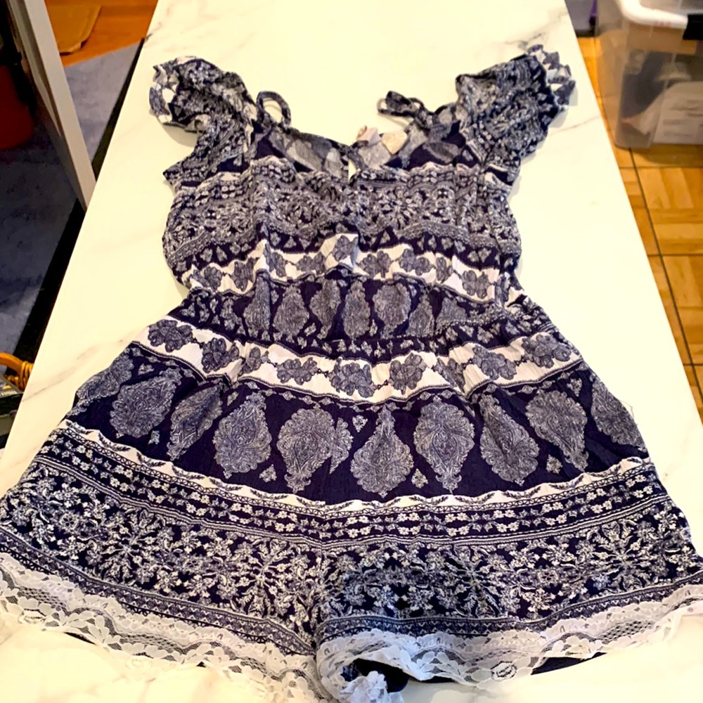White print romper, size small.